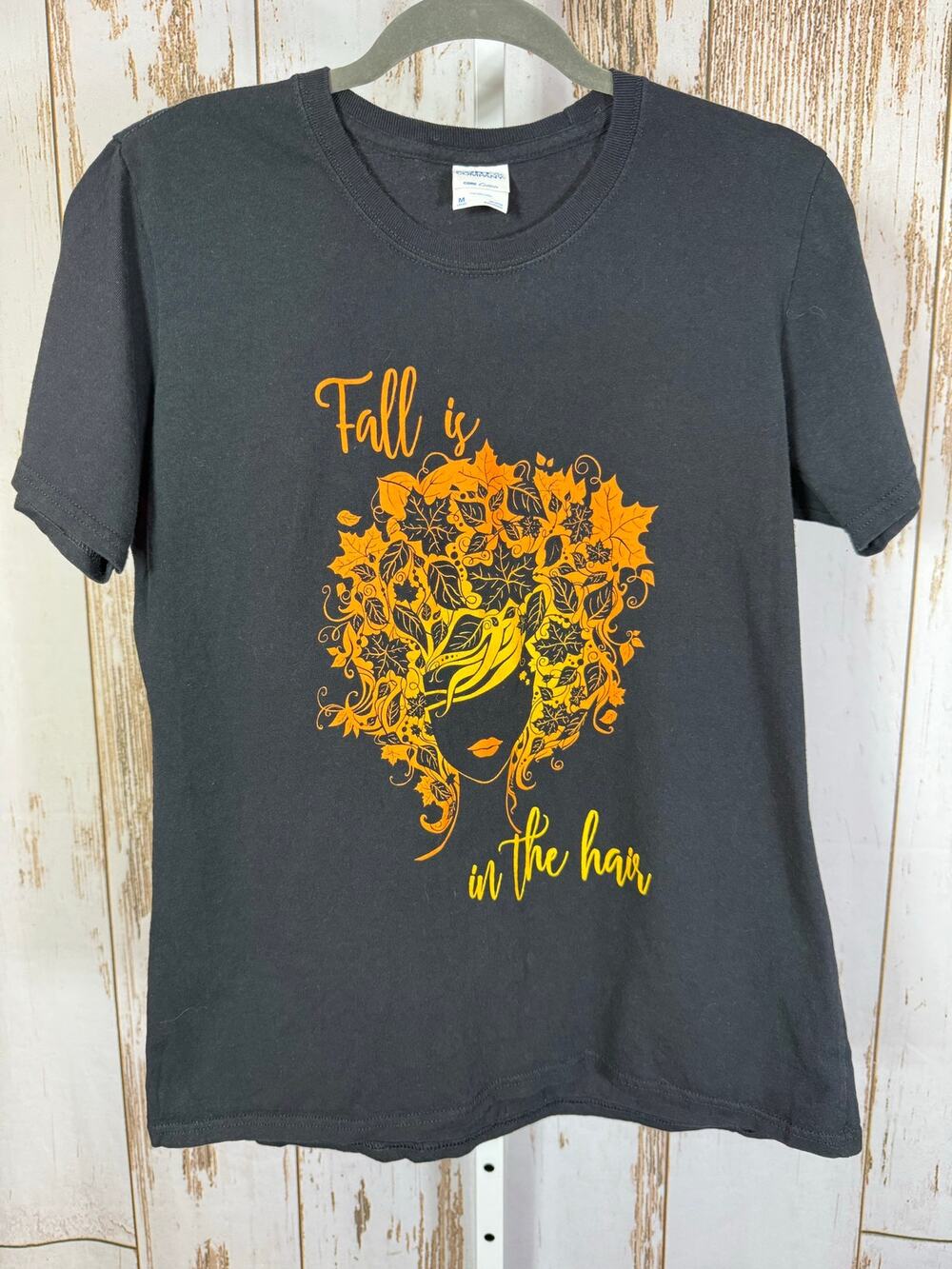 Port & Company, Fall is in the Hair, Graphic T-Shirt. Size Medium. Good used con